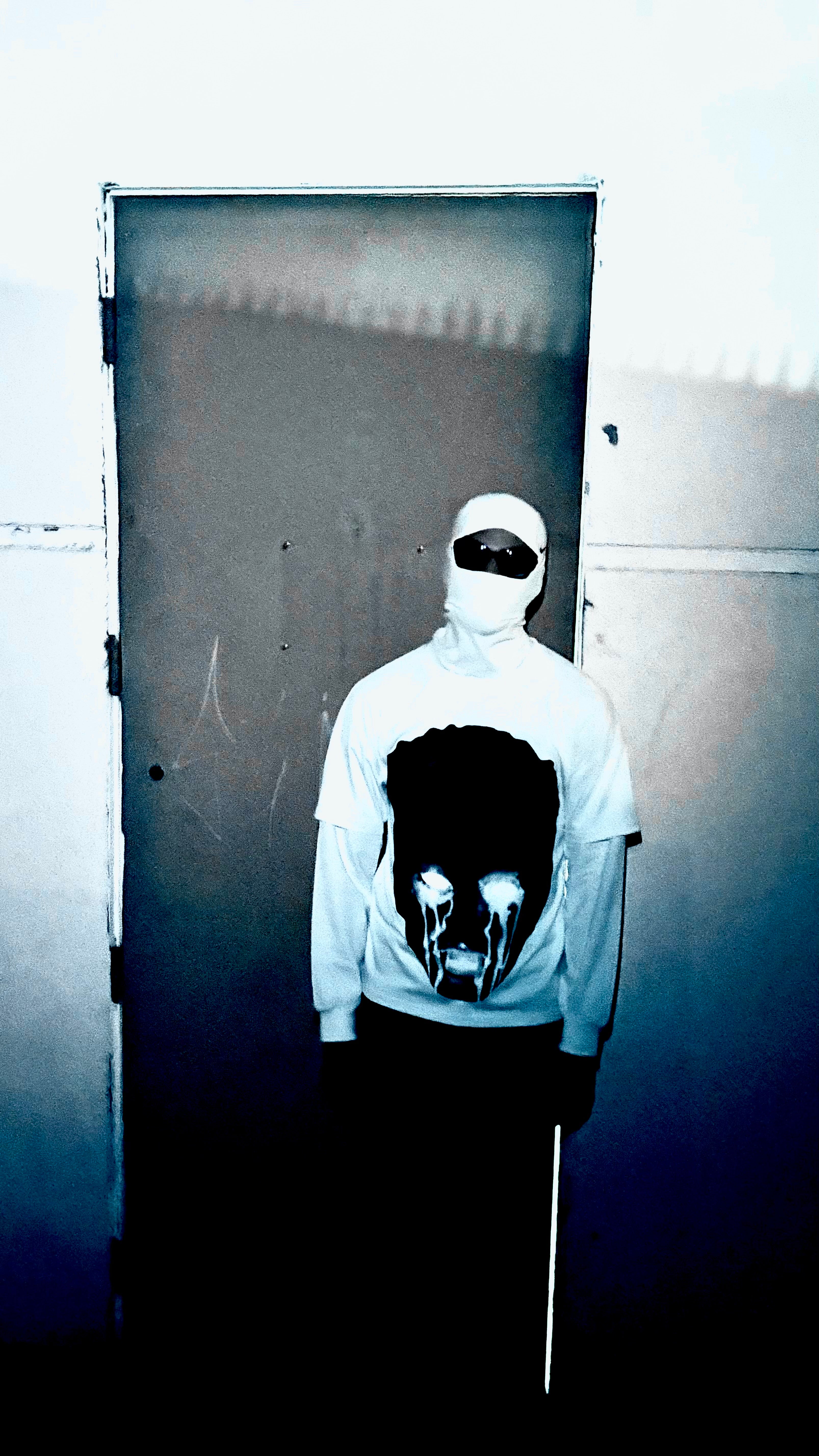 Double layered white long sleeve Hellraiser tee
